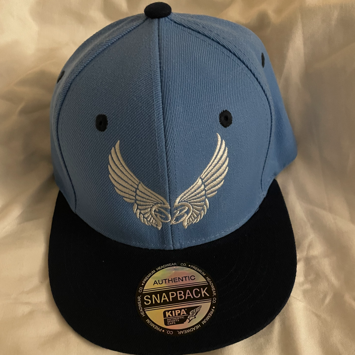 Governors Brand LLC Snap back hat / Carolina blue & Navy